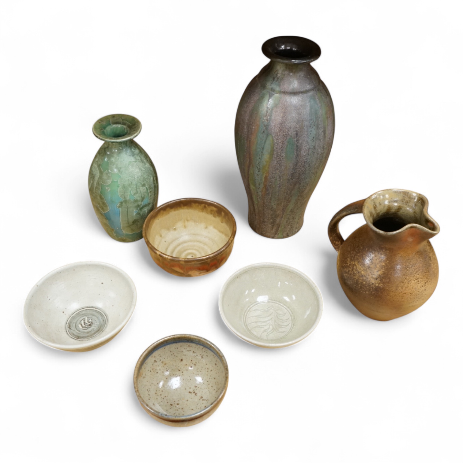 Six pieces of Studio pottery and a vase, largest 32cm high